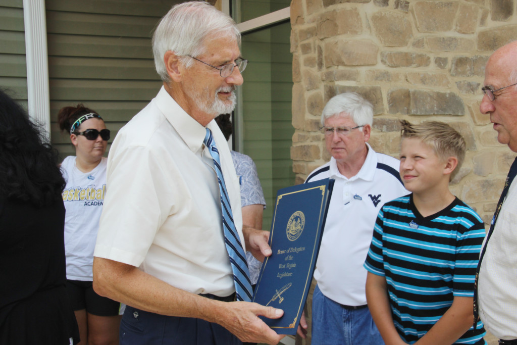 Roger Engle greets friends following a ceremony held at Hedgesville Public Library on June 20, 2015 to honor the award-winning, West Virginia author. | Photo by Stephanie Engle